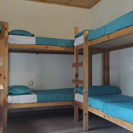 Cama Hab Compartida - Triton Hostal